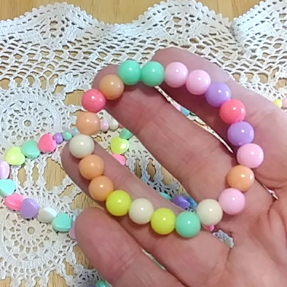 New girl's pastel costume jewelry sets - hearts and dino teeth